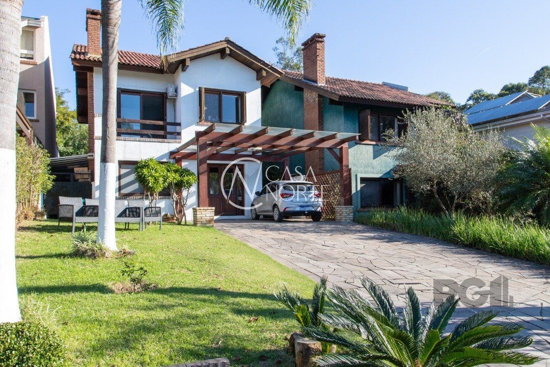 Casa de Condomínio à venda com 4 quartos, 226m², 2 suítes, 4 vagas, Avenida Juca Batista no bairro Belém Novo em Porto Alegre