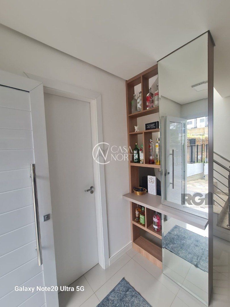 Casa à venda com 3 quartos, 100m², 1 suíte, 2 vagas, Rua Manoel Fernandes no bairro Guarujá em Porto Alegre