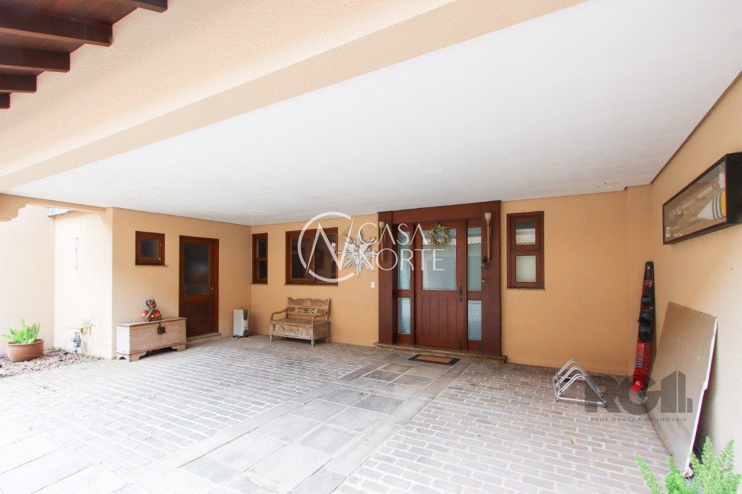 Casa de Condomínio à venda com 3 quartos, 327m², 3 suítes, 3 vagas, Avenida Otto Niemeyer no bairro Tristeza em Porto Alegre