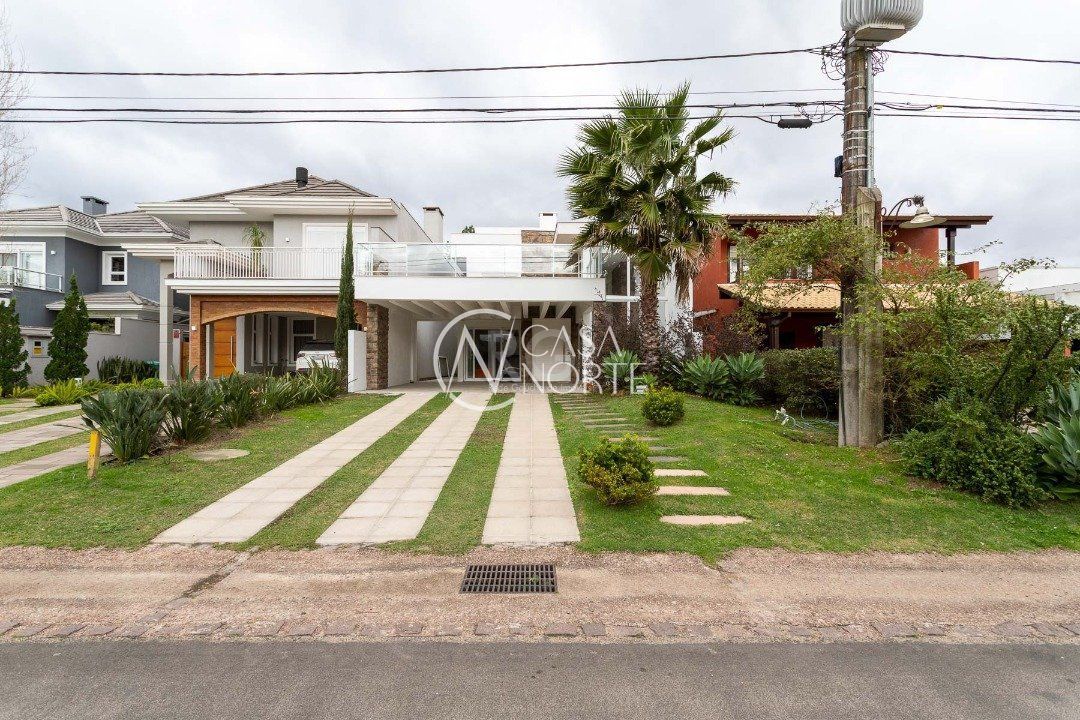 Casa de Condomínio à venda com 5 quartos, 294m², 5 suítes, 4 vagas, Avenida Juca Batista no bairro Belém Novo em Porto Alegre