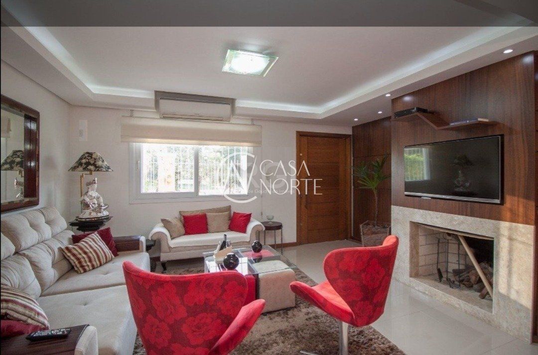 Casa à venda com 3 quartos, 256m², 3 suítes, 2 vagas, Rua Doutor Possidonio Cunha no bairro Vila Assunção em Porto Alegre