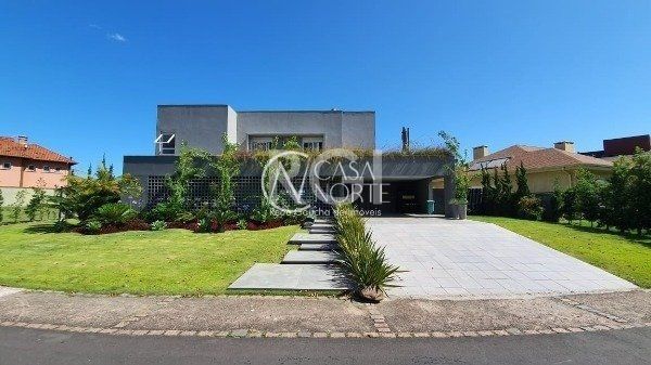 Casa de Condomínio à venda com 4 quartos, 478m², 4 suítes, 4 vagas, Avenida Juca Batista no bairro Chapéu do Sol em Porto Alegre