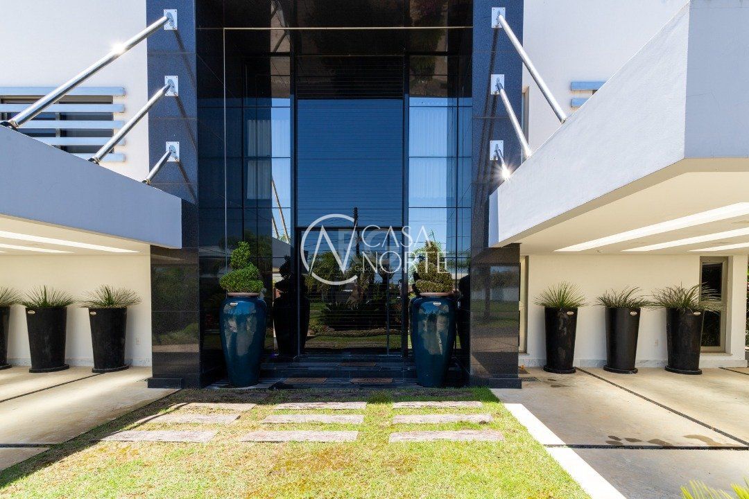 Casa de Condomínio à venda com 5 quartos, 720m², 5 suítes, 4 vagas, Avenida Juca Batista no bairro Belém Novo em Porto Alegre