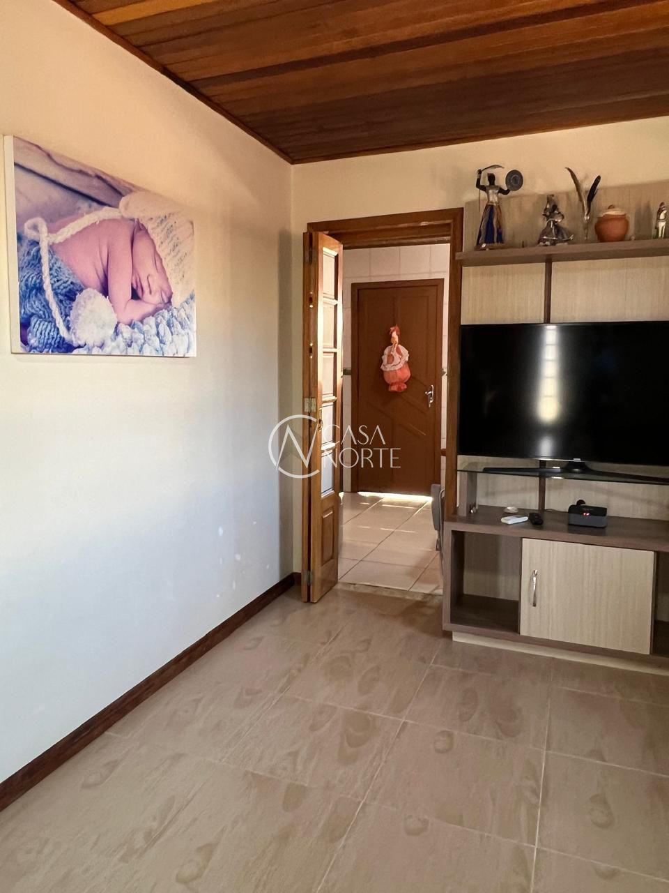 Casa à venda com 4 quartos, 250m², 2 suítes, 4 vagas, Rua Santos no bairro Campo Novo em Porto Alegre