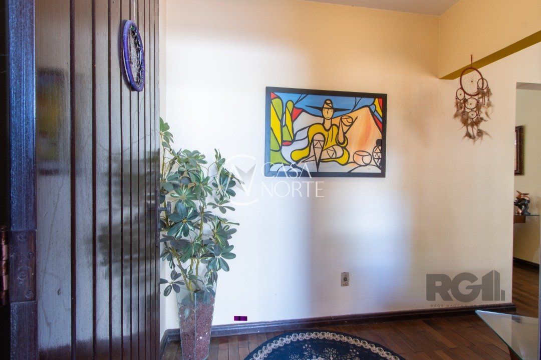 Casa à venda com 4 quartos, 389m², 1 suíte, 3 vagas, Rua Doutor Mário Totta no bairro Tristeza em Porto Alegre