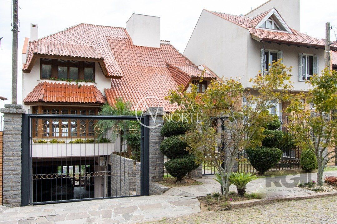 Casa à venda com 4 quartos, 509m², 2 suítes, 4 vagas, Rua Doutor Arnaldo da Silva Ferreira no bairro Ipanema em Porto Alegre