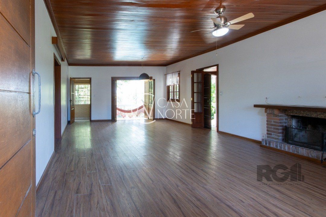 Casa à venda com 4 quartos, 218m², 1 suíte, 7 vagas, Rua dos Guaranis no bairro Espírito Santo em Porto Alegre