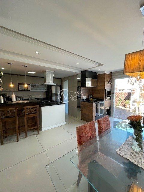 Casa de Condomínio à venda com 3 quartos, 199m², 1 suíte, 3 vagas, Rua Jorge Babot Miranda no bairro Aberta dos Morros em Porto Alegre