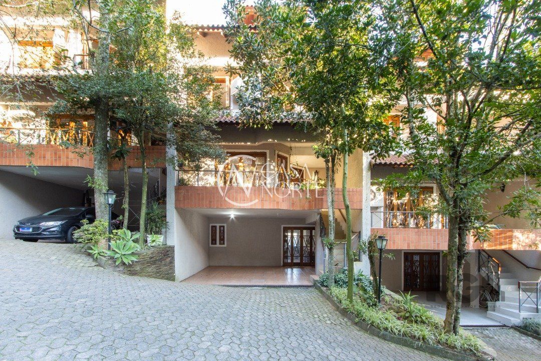 Casa de Condomínio à venda com 3 quartos, 249m², 1 suíte, 4 vagas, Rua José Sanguinetti no bairro Jardim Isabel em Porto Alegre