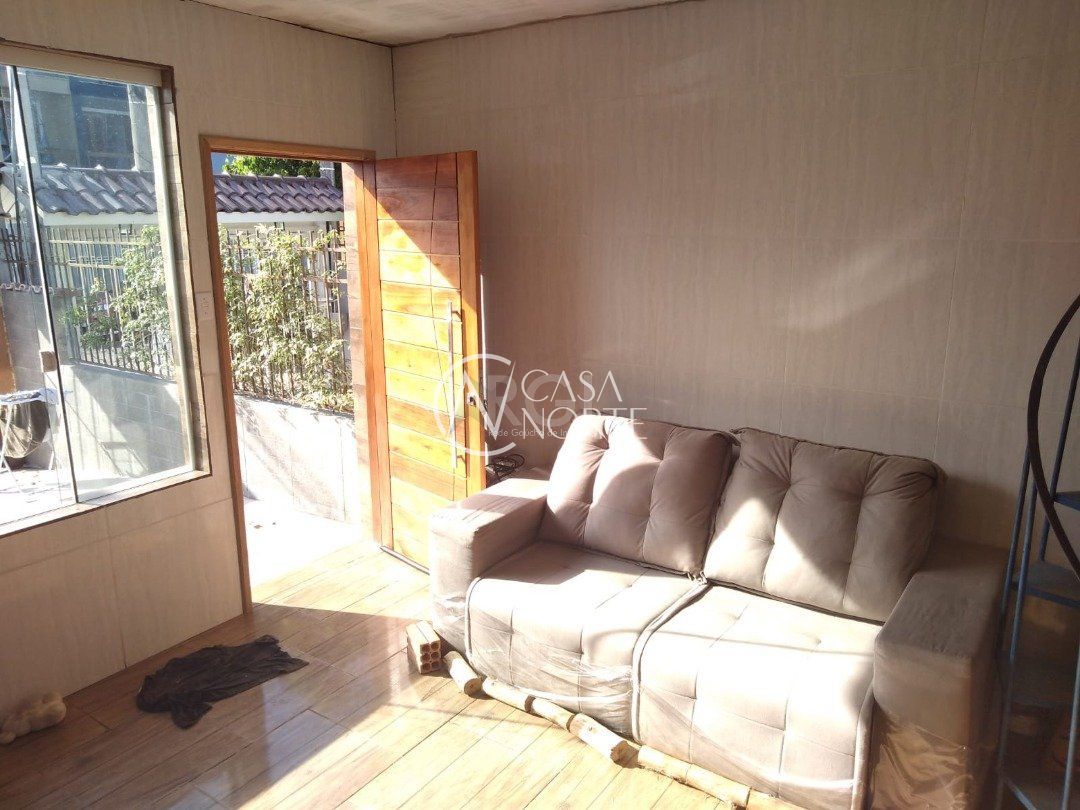 Casa à venda com 2 quartos, 72m², 1 vaga, Rua Romano Rolando Botin no bairro Hípica em Porto Alegre