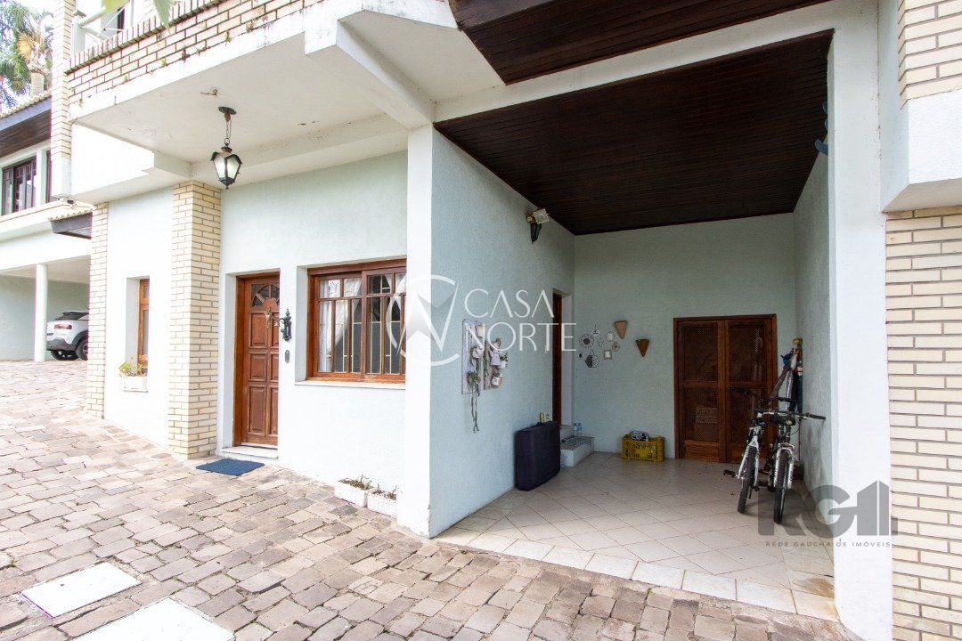 Casa de Condomínio à venda com 3 quartos, 225m², 1 suíte, 2 vagas, Rua João Mendes Ouriques no bairro Jardim Isabel em Porto Alegre