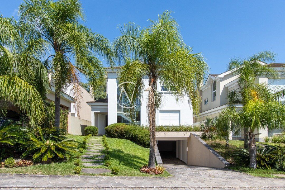 Casa de Condomínio à venda com 4 quartos, 551m², 4 suítes, 6 vagas, Avenida Coronel Marcos no bairro Pedra Redonda em Porto Alegre