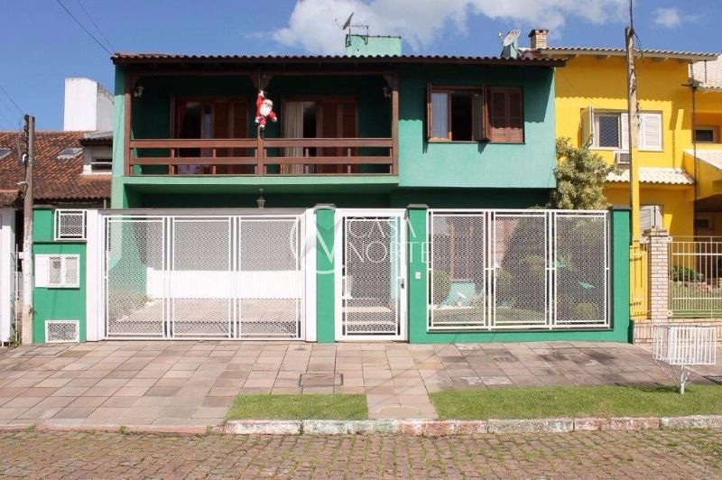 Casa à venda com 3 quartos, 350m², 1 suíte, 4 vagas, Rua Engenheiro Renato Costa Leite no bairro Aberta dos Morros em Porto Alegre