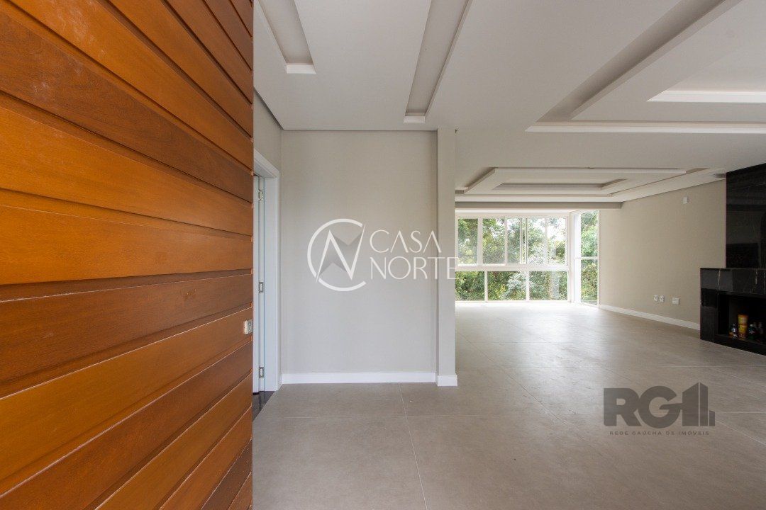 Casa à venda com 3 quartos, 260m², 2 suítes, 4 vagas, Rua Corrêa Lima no bairro Santa Tereza em Porto Alegre