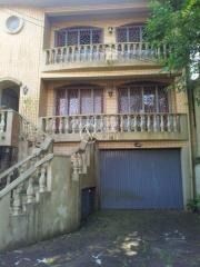 Casa à venda com 6 quartos, 600m², 6 suítes, 9 vagas, Praça José Assunção no bairro Vila Assunção em Porto Alegre