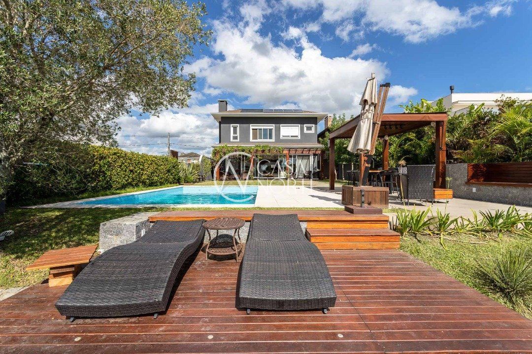 Casa de Condomínio à venda com 4 quartos, 340m², 4 suítes, 4 vagas, Avenida Juca Batista no bairro Terraville em Porto Alegre