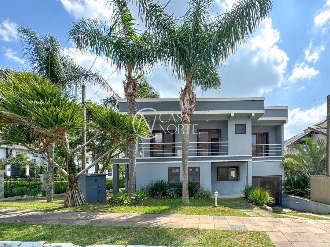 Casa de Condomínio à venda com 4 quartos, 435m², 4 suítes, 6 vagas, Rua Tocantins no bairro Lomba do Pinheiro em Porto Alegre