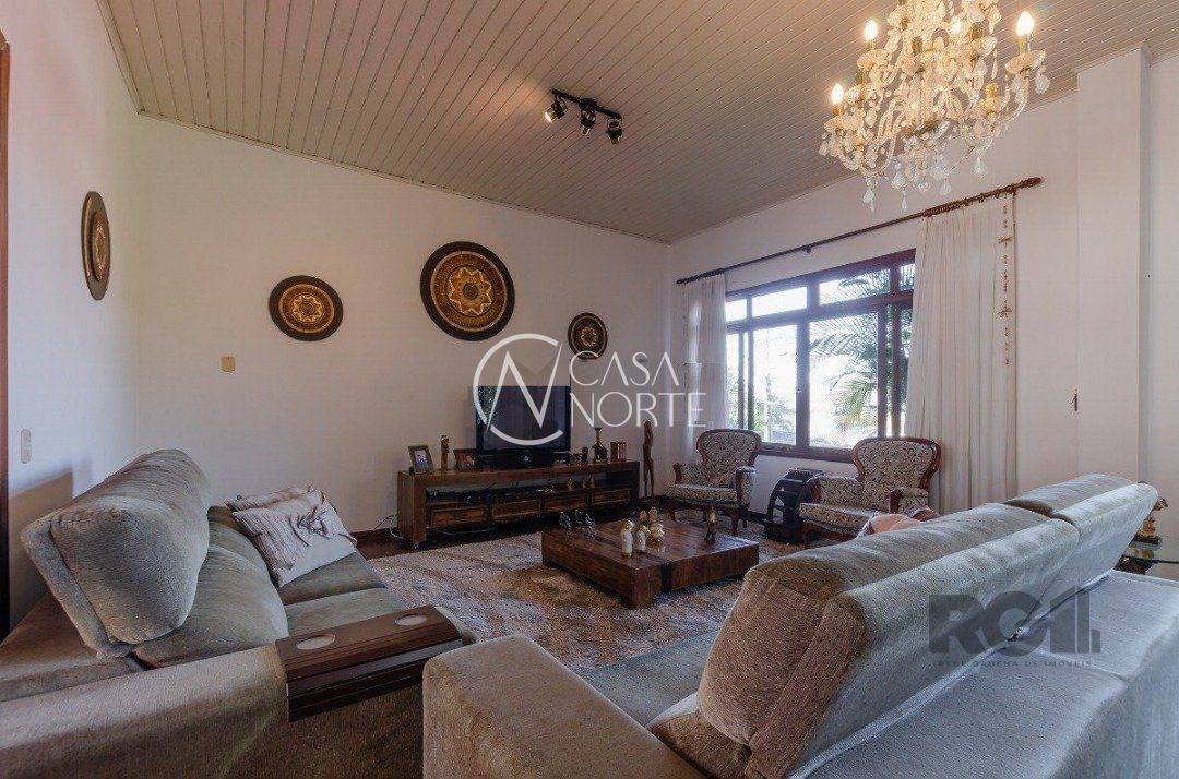 Casa de Condomínio à venda com 3 quartos, 450m², 1 suíte, 3 vagas, Avenida Firmino Octavio Bimbi no bairro Cavalhada em Porto Alegre