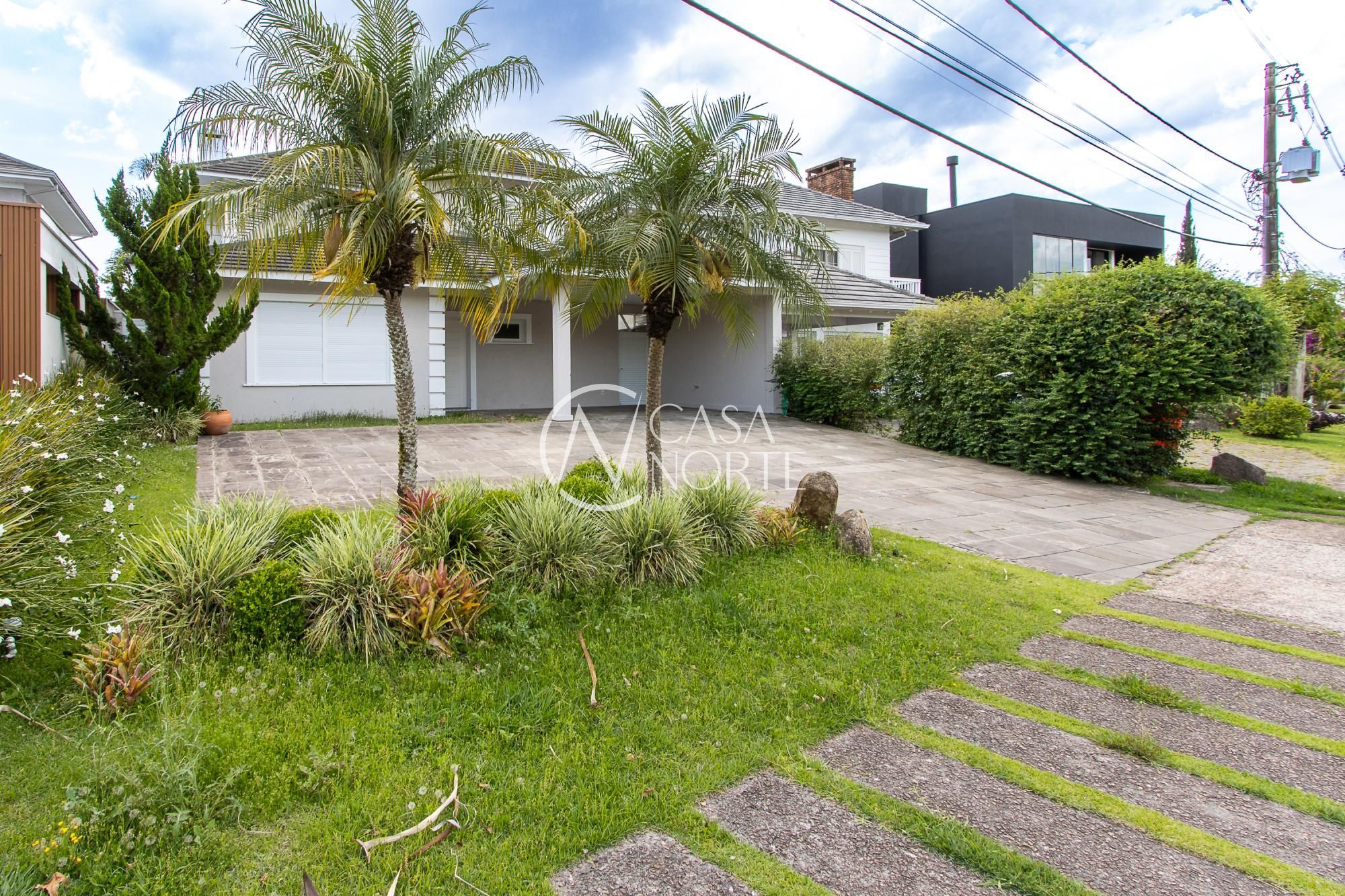 Casa de Condomínio à venda com 4 quartos, 350m², 4 suítes, 5 vagas, Avenida Juca Batista no bairro Belém Novo em Porto Alegre