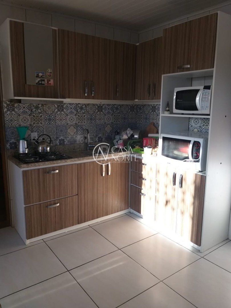 Casa à venda com 4 quartos, 202m², 2 vagas, Acesso Três no bairro Restinga em Porto Alegre