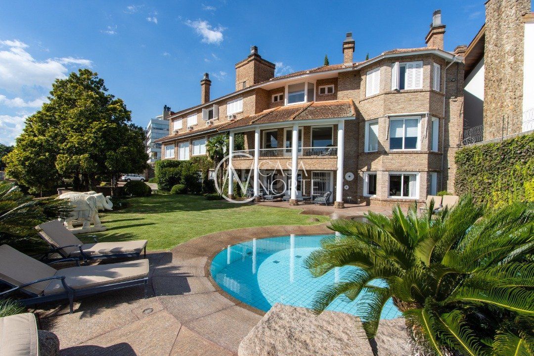 Casa à venda com 7 quartos, 1319m², 1 suíte, 6 vagas, Rua Coronel Antônio Dias de Oliveira no bairro Santa Tereza em Porto Alegre