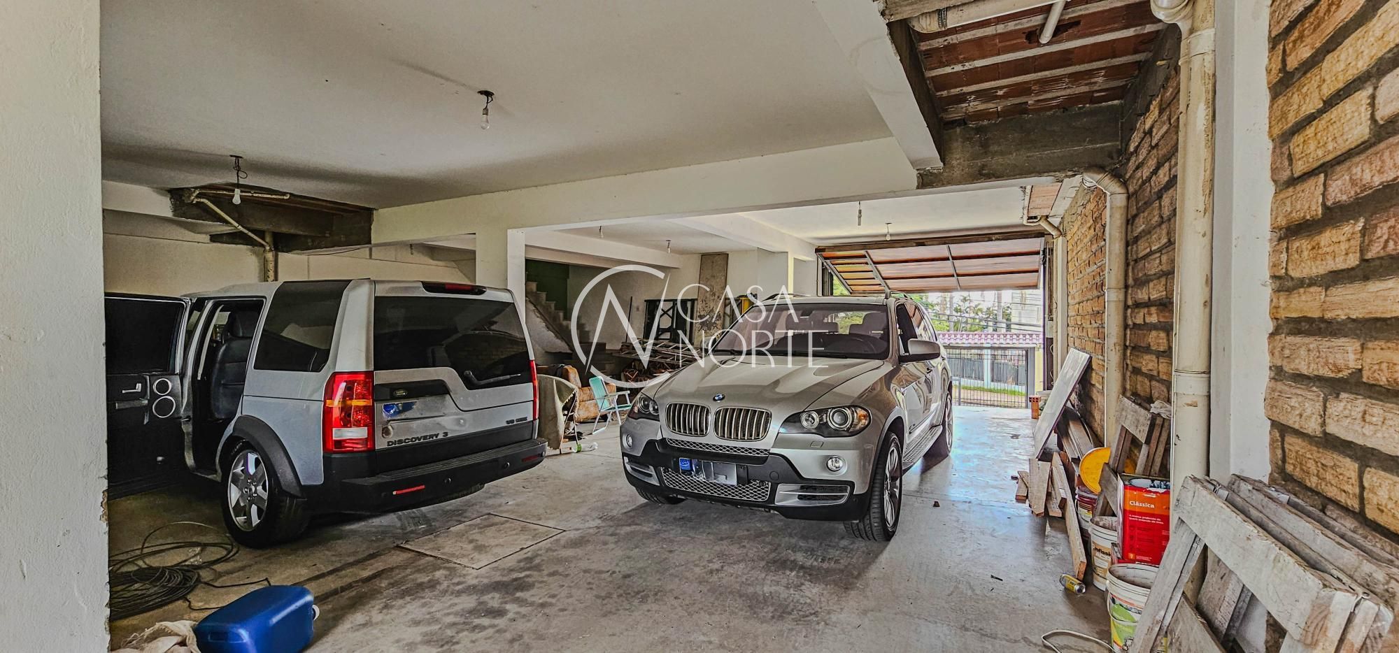 Casa à venda com 5 quartos, 980m², 2 suítes, 5 vagas, Rua Corrêa Lima no bairro Santa Tereza em Porto Alegre