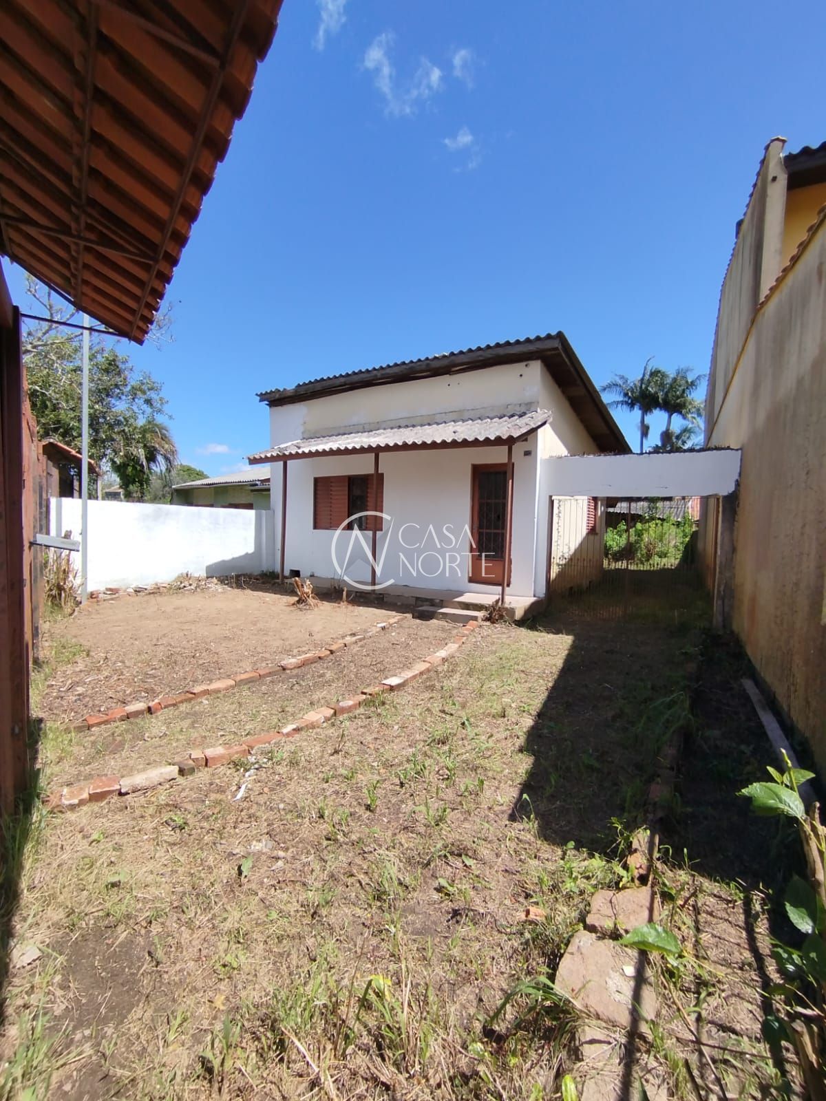 Casa à venda com 1 quarto, 58m², 2 vagas, Rua dos Guenoas no bairro Guarujá em Porto Alegre