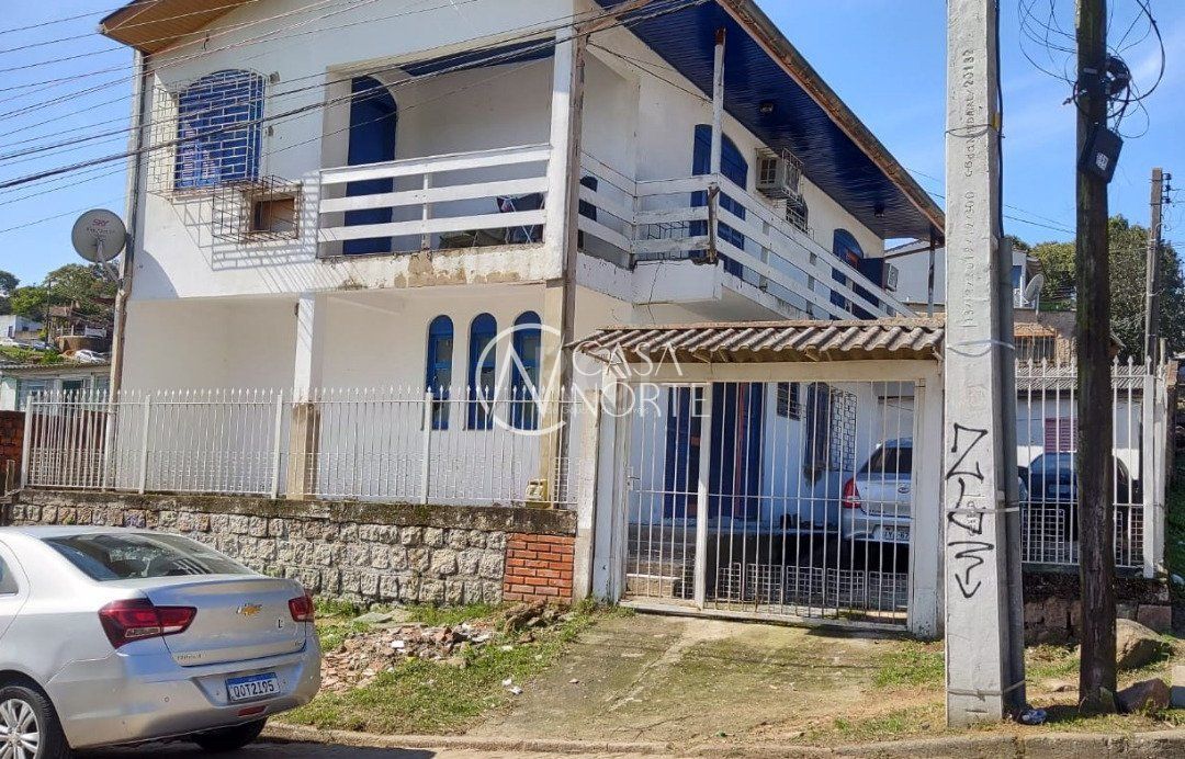 Casa à venda com 4 quartos, 236m², 4 vagas, Rua Martins de Lima no bairro Vila São José em Porto Alegre