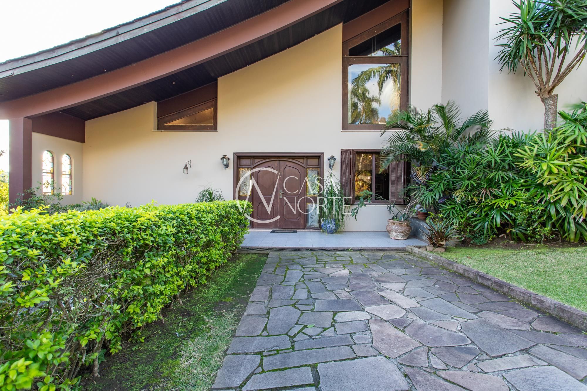 Casa de Condomínio à venda com 5 quartos, 565m², 4 suítes, 4 vagas, Avenida da Cavalhada no bairro Cavalhada em Porto Alegre