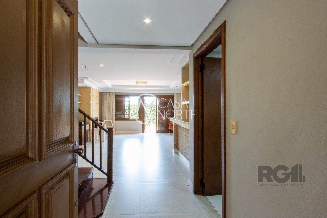 Casa de Condomínio à venda com 3 quartos, 249m², 1 suíte, 3 vagas, Rua Manajó no bairro Vila Assunção em Porto Alegre