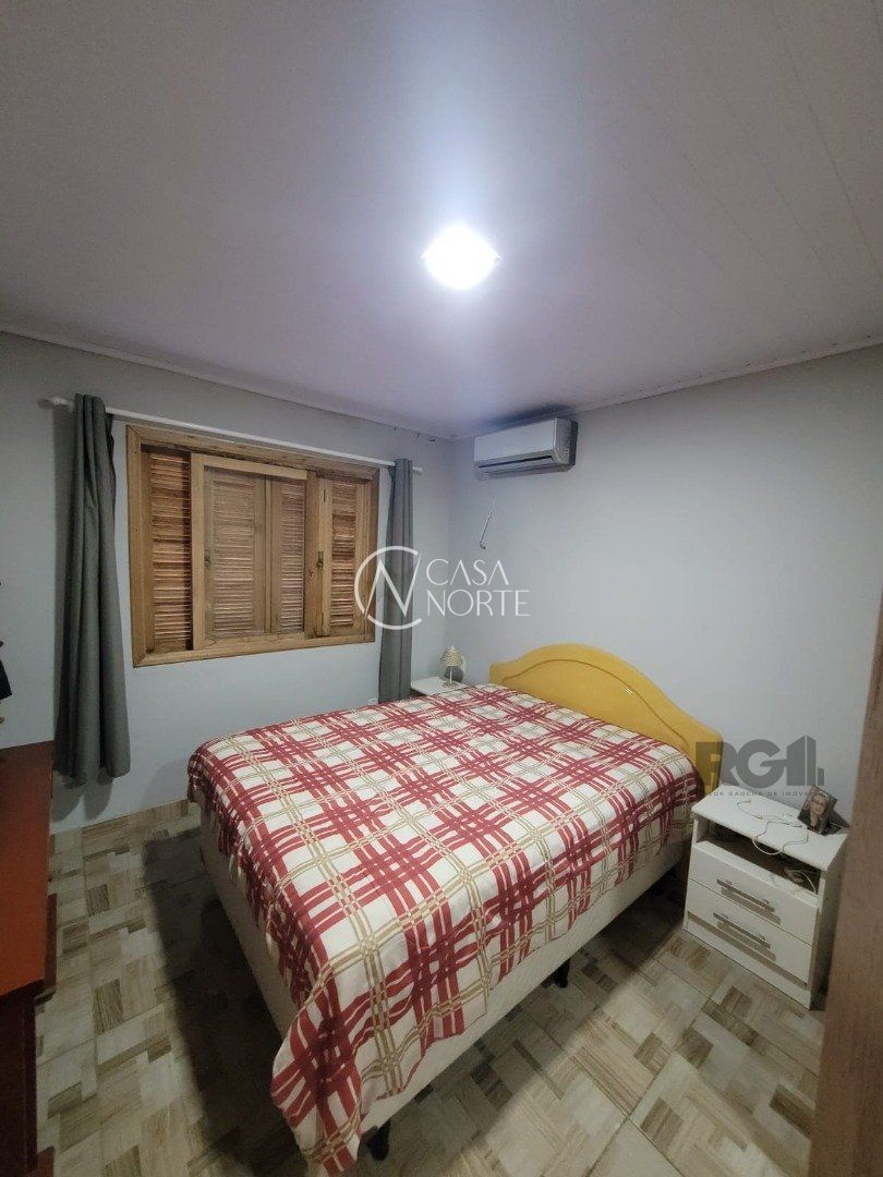 Casa à venda com 2 quartos, 142m², 1 suíte, 2 vagas, Avenida Orleaes no bairro Guarujá em Porto Alegre