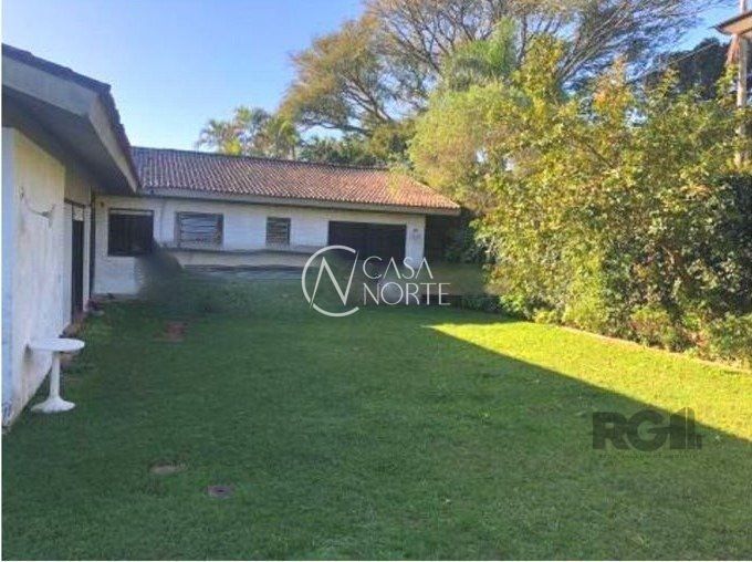 Casa à venda com 5 quartos, 305m², 4 suítes, 2 vagas, Avenida Jacuí no bairro Cristal em Porto Alegre