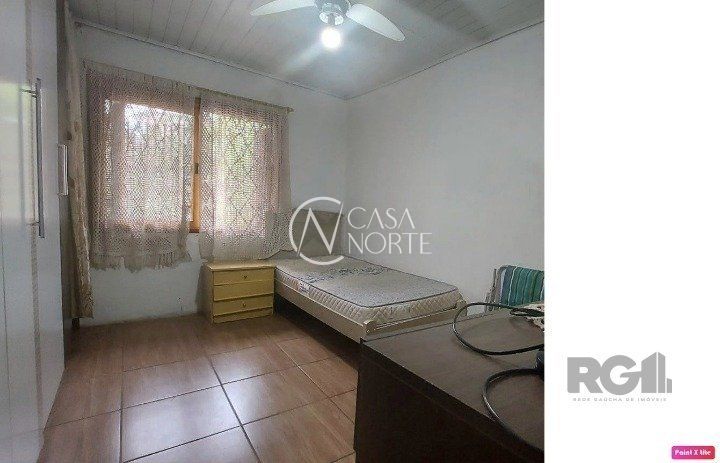 Casa à venda com 2 quartos, 100m², 1 vaga, Rua São Sebastião do Cai no bairro Camaquã em Porto Alegre