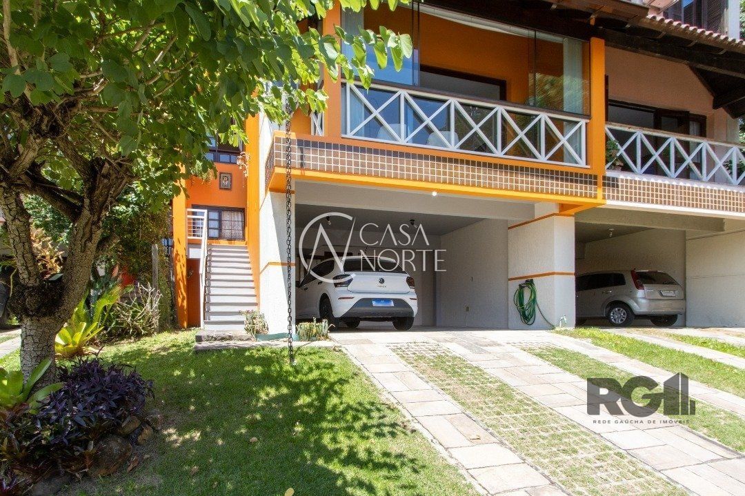 Casa de Condomínio à venda com 3 quartos, 274m², 1 suíte, 2 vagas, Rua Álvaro Guterres no bairro Tristeza em Porto Alegre
