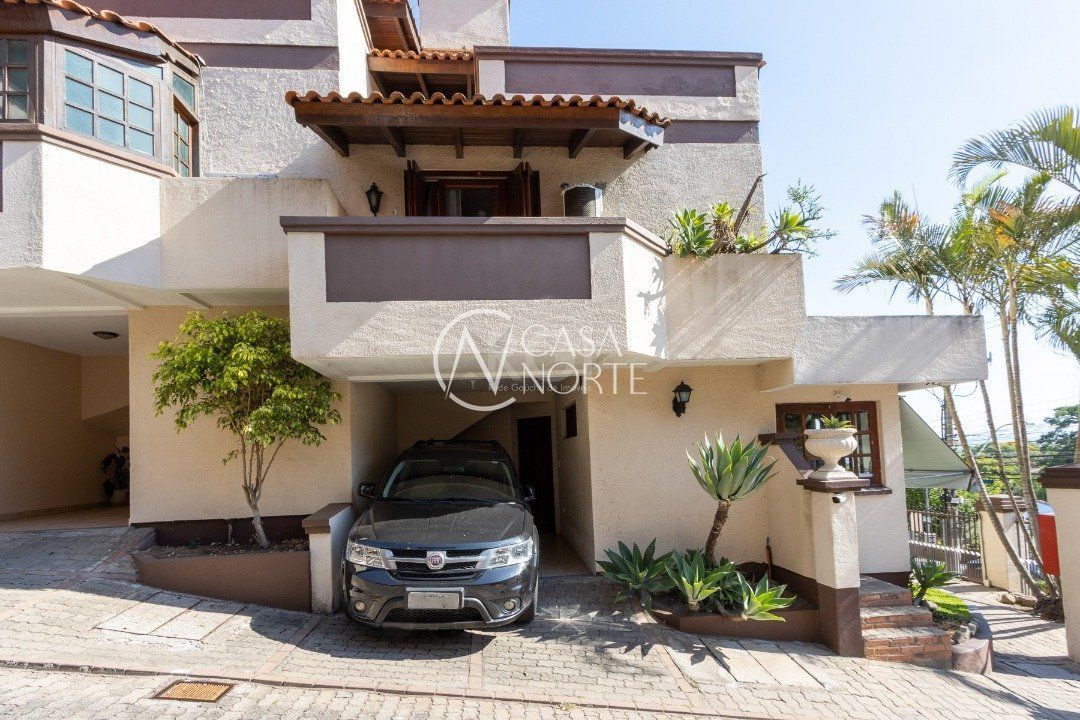 Casa de Condomínio à venda com 3 quartos, 211m², 1 suíte, 2 vagas, Avenida Wenceslau Escobar no bairro Tristeza em Porto Alegre