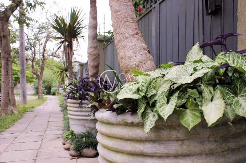 Casa de Condomínio à venda com 4 quartos, 347m², 2 suítes, 2 vagas, Rua Bororo no bairro Vila Assunção em Porto Alegre