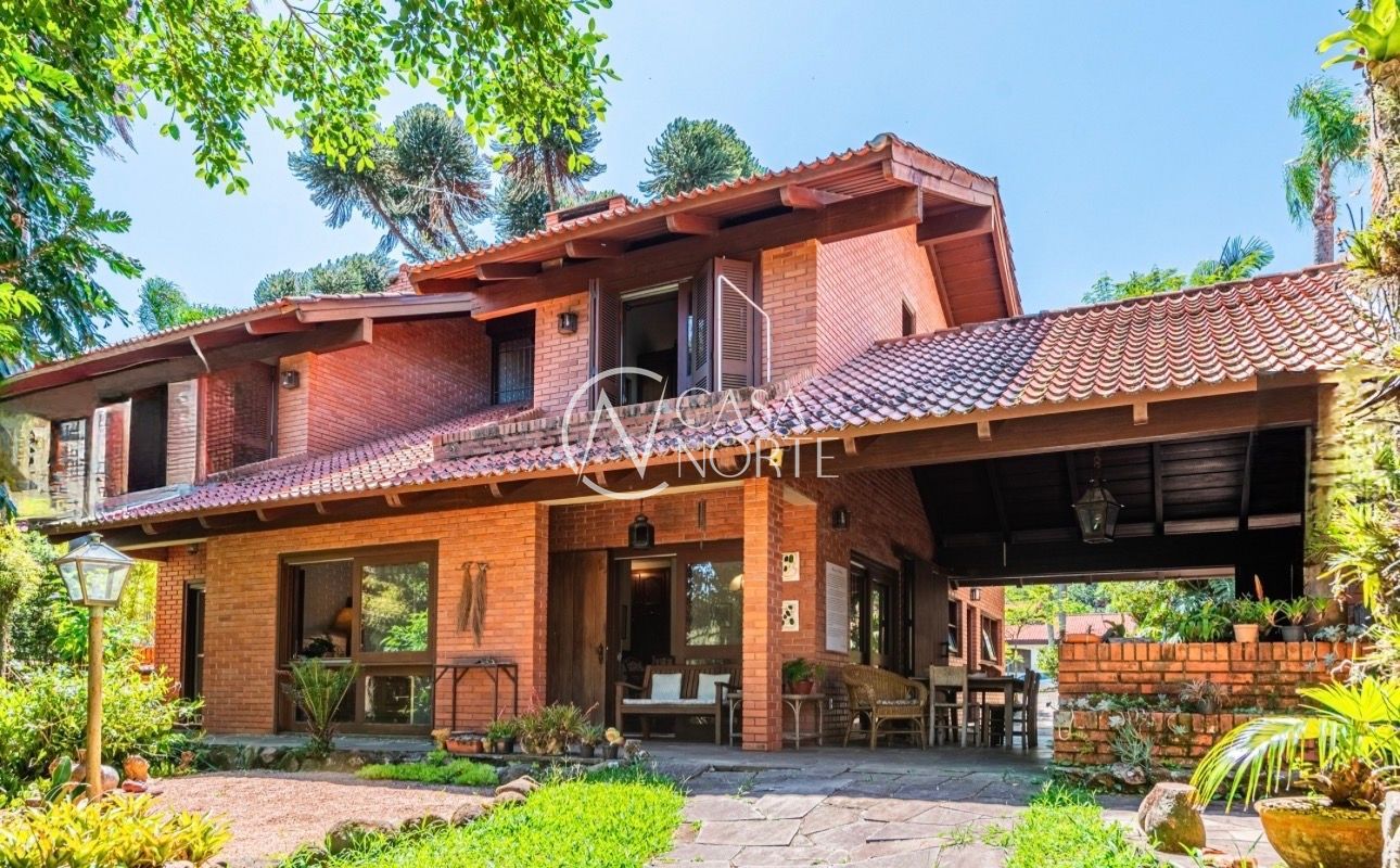 Casa à venda com 4 quartos, 261m², 2 suítes, 5 vagas, Avenida Arlindo Pasqualini no bairro Jardim Isabel em Porto Alegre