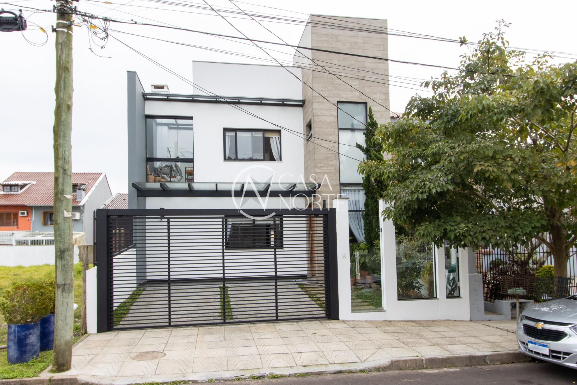 Casa à venda com 4 quartos, 179m², 2 suítes, 2 vagas, Rua Nestor José Nitschke no bairro Guarujá em Porto Alegre