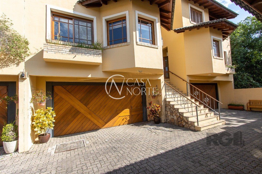 Casa de Condomínio à venda com 3 quartos, 200m², 1 suíte, 3 vagas, Rua Landel de Moura no bairro Tristeza em Porto Alegre