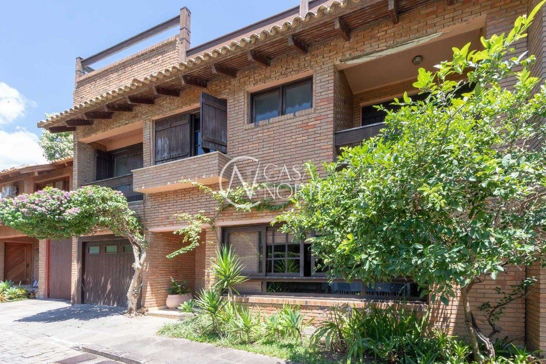 Casa de Condomínio à venda com 4 quartos, 331m², 4 suítes, 2 vagas, Rua Carlos Julio Becker no bairro Tristeza em Porto Alegre