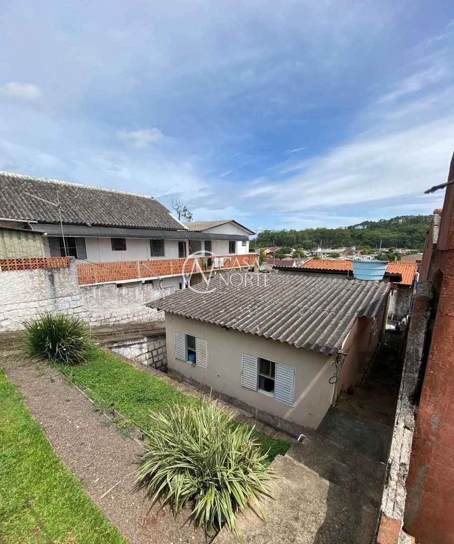 Casa à venda com 2 quartos, 300m², 2 vagas, Avenida Vereador Roberto Landell de Moura no bairro Campo Novo em Porto Alegre