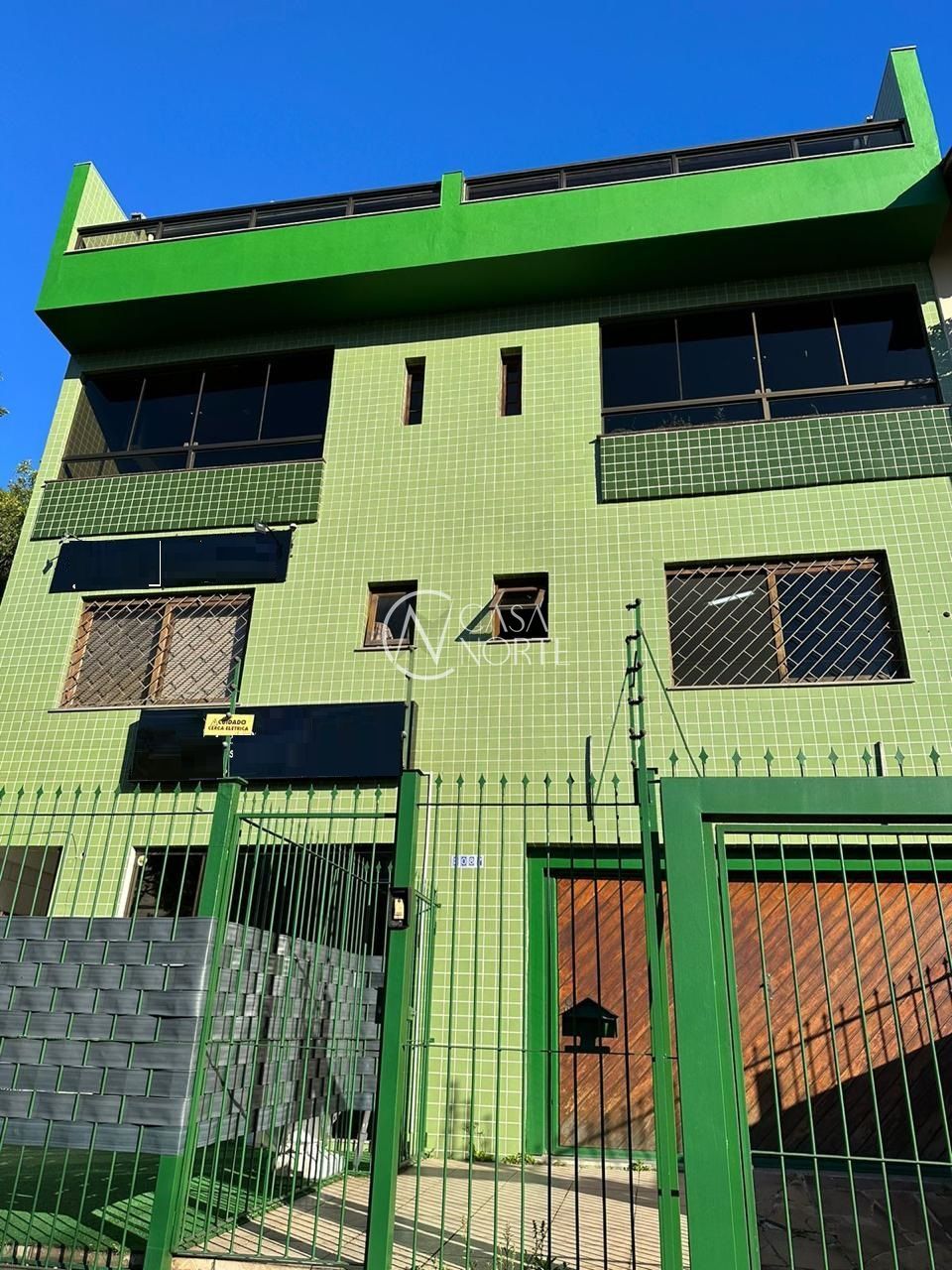 Prédio Comercial à venda com 7 quartos, 637m², 5 vagas, Rua Doutor Pereira Neto no bairro Camaquã em Porto Alegre