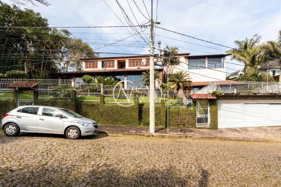 Casa à venda com 4 quartos, 500m², 1 suíte, 4 vagas, Rua Simao Bolivar no bairro Vila Conceição em Porto Alegre