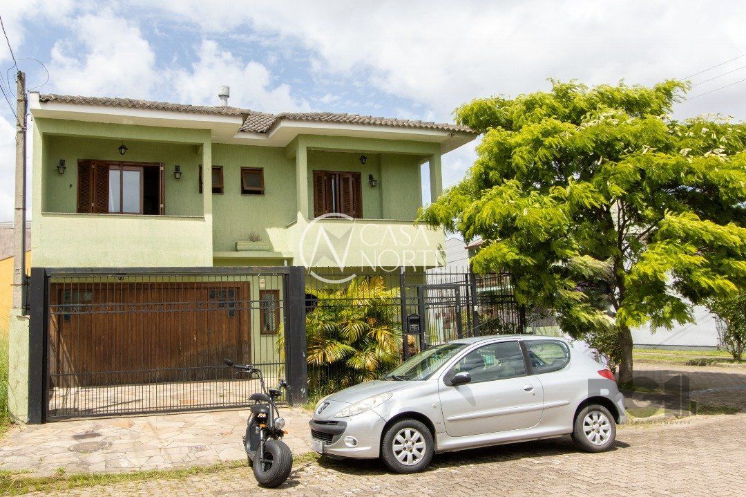 Casa à venda com 3 quartos, 174m², 1 suíte, 2 vagas, Rua Louro no bairro Hípica em Porto Alegre