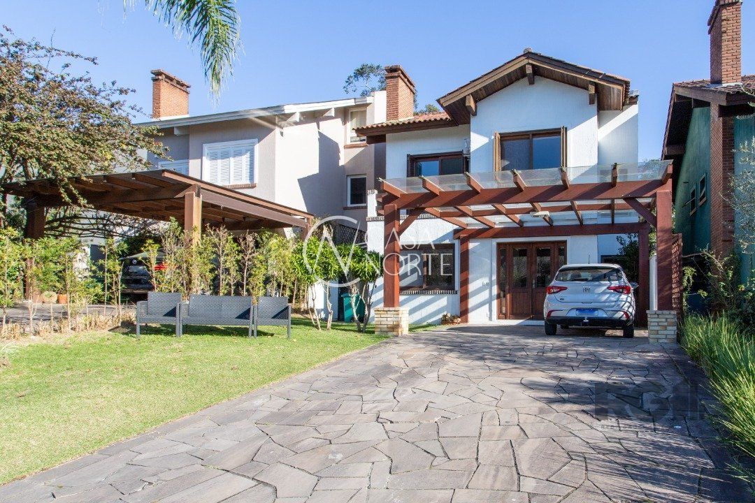 Casa de Condomínio à venda com 4 quartos, 226m², 2 suítes, 4 vagas, Avenida Juca Batista no bairro Belém Novo em Porto Alegre