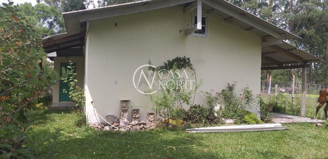 Casa à venda com 4 quartos, 121m², 2 vagas, Rua Adao Martins da Rocha no bairro São Caetano em Porto Alegre