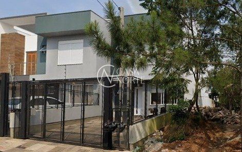 Casa à venda com 3 quartos, 100m², 1 suíte, 2 vagas, Rua Manoel Fernandes no bairro Guarujá em Porto Alegre