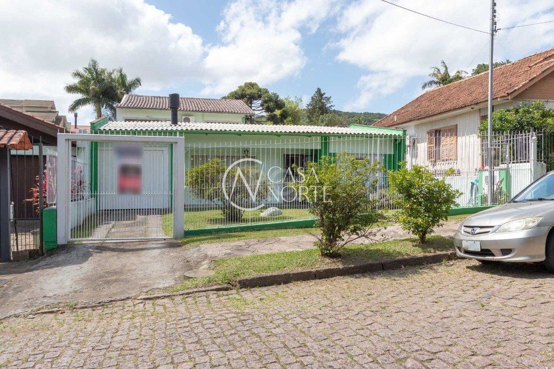 Casa à venda com 4 quartos, 182m², 1 suíte, 4 vagas, Rua Morano Calabro no bairro Jardim Isabel em Porto Alegre