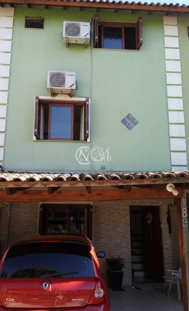Casa à venda com 3 quartos, 94m², 2 vagas, Rua Cangussu no bairro Nonoai em Porto Alegre