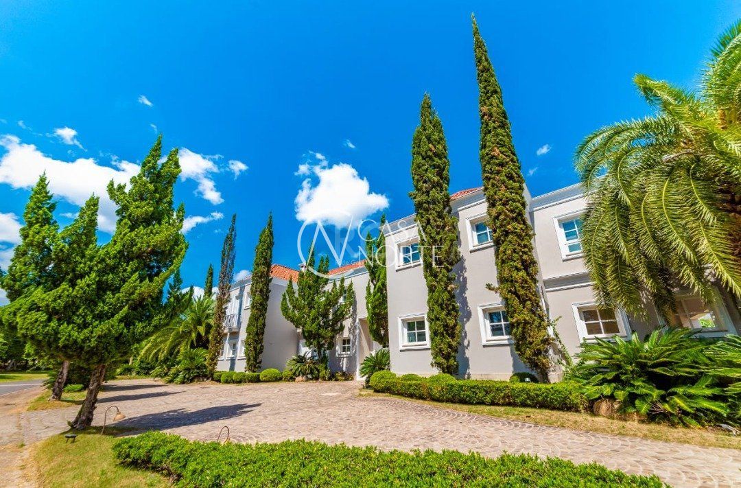 Casa de Condomínio à venda com 6 quartos, 745m², 4 suítes, 6 vagas, Avenida Juca Batista no bairro Belém Novo em Porto Alegre